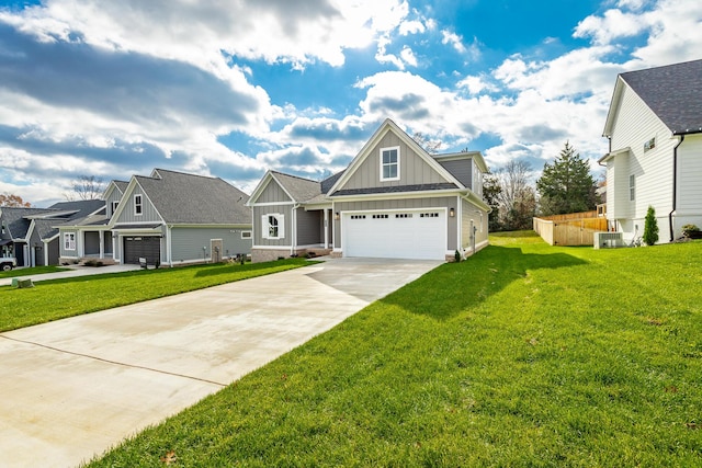 craftsman house featuring central AC, a garage, and a front lawn