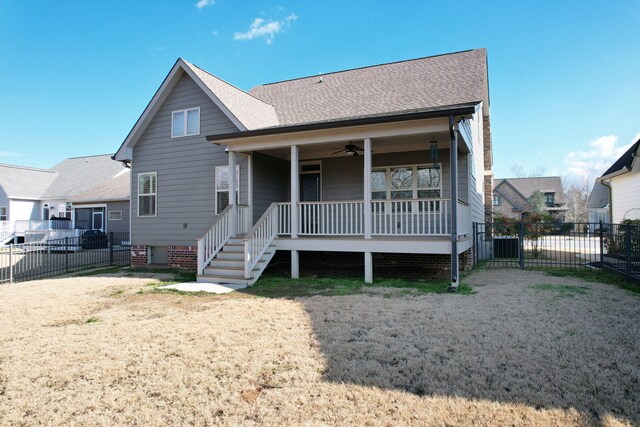 view of front facade with ceiling fan and a porch