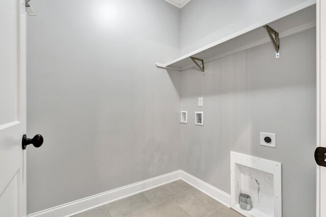 washroom featuring light tile patterned flooring, hookup for a washing machine, and electric dryer hookup