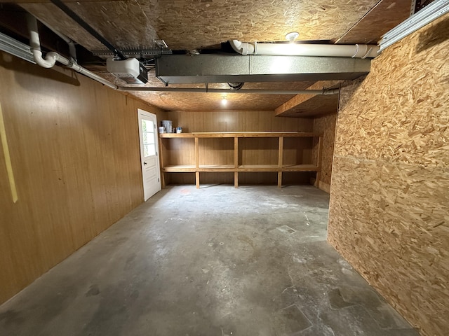 basement with wood walls