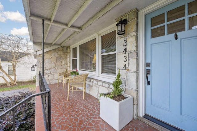 entrance to property with covered porch