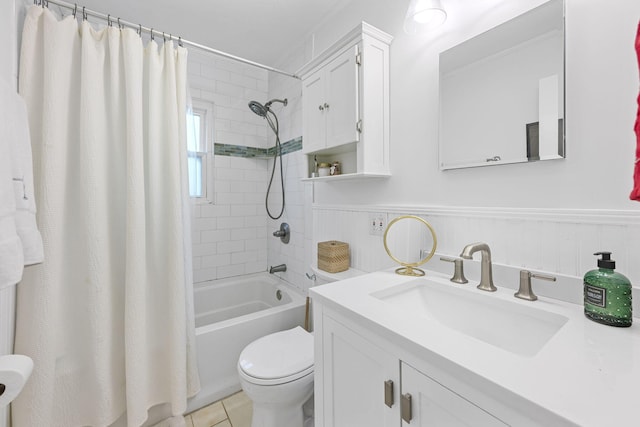 full bathroom featuring shower / bath combo, tile patterned flooring, toilet, wooden walls, and vanity