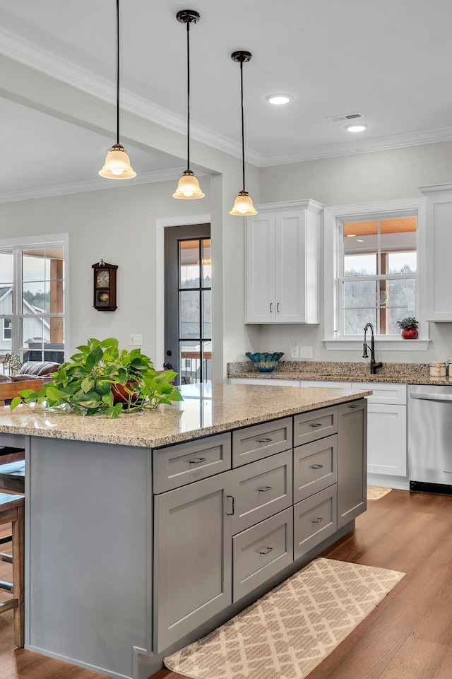 kitchen with gray cabinets, white cabinetry, and stainless steel dishwasher