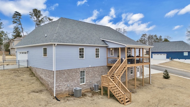 back of property with central AC unit