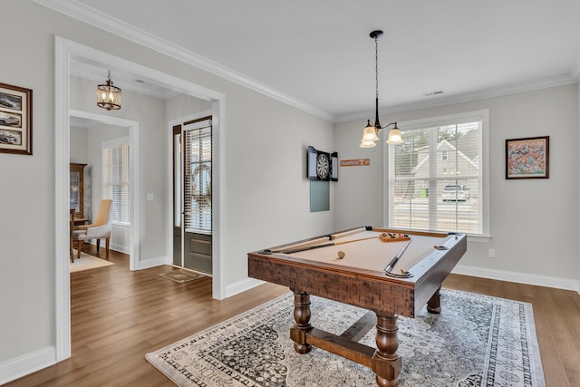 recreation room with crown molding, billiards, and hardwood / wood-style flooring