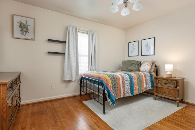 bedroom featuring hardwood / wood-style flooring