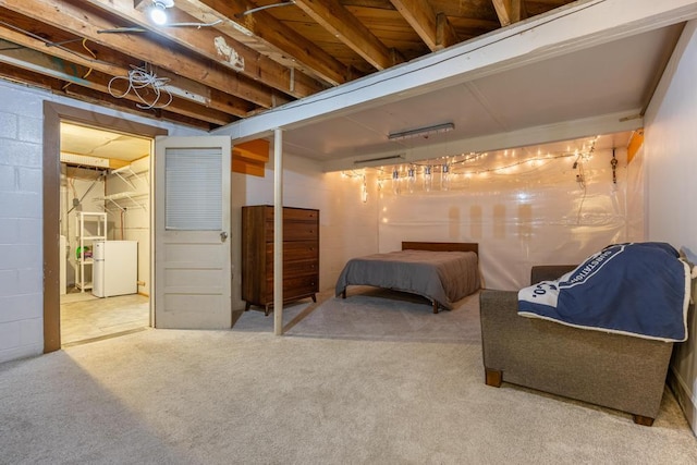 bedroom featuring carpet floors and white fridge