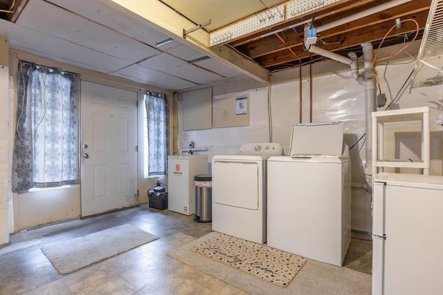 washroom featuring washing machine and dryer