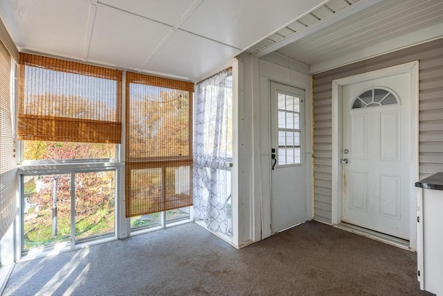 unfurnished sunroom with a healthy amount of sunlight