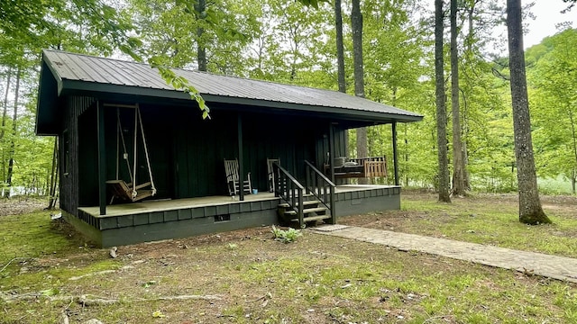 exterior space featuring covered porch