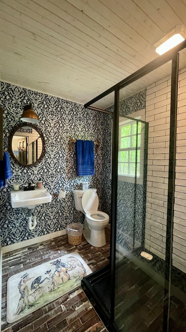 bathroom with a shower, toilet, wooden ceiling, and sink