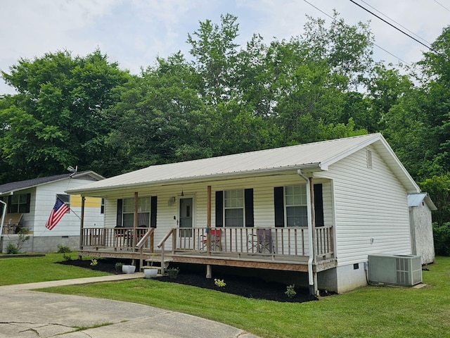1896 Old Washington Hwy, Dayton, TN 37321 - view of front facade with crawl space, covered porch, cooling unit, and metal roof
