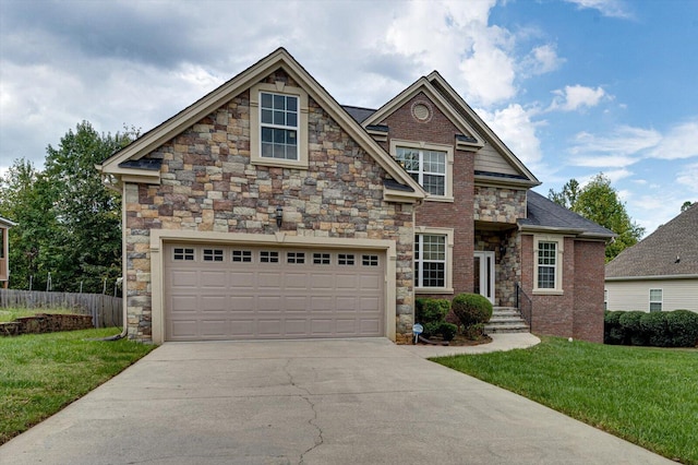 craftsman-style house featuring a front yard and a garage