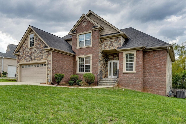 view of front of house featuring central AC unit, a garage, and a front lawn