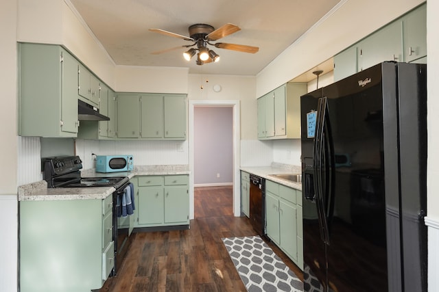 kitchen with black appliances, ceiling fan, dark hardwood / wood-style flooring, and green cabinetry