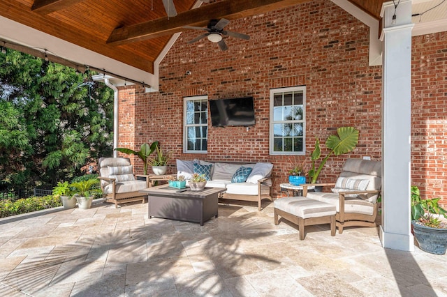 view of patio featuring an outdoor hangout area and ceiling fan