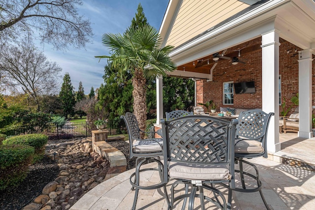 view of patio / terrace featuring ceiling fan