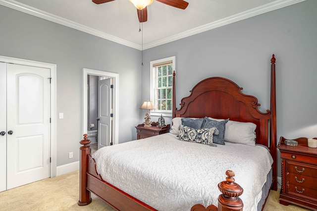 carpeted bedroom with ceiling fan, crown molding, and a closet