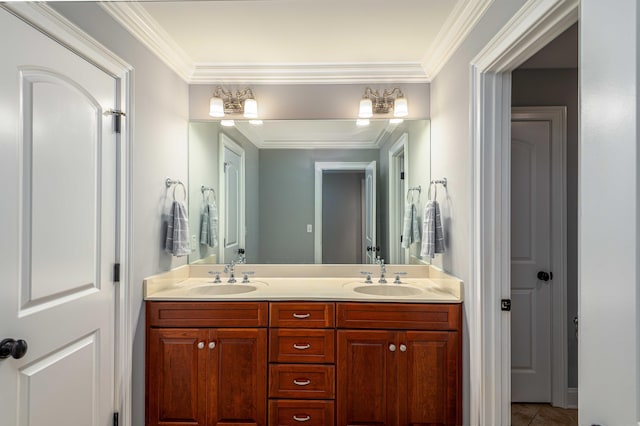 bathroom featuring crown molding, tile patterned flooring, and vanity