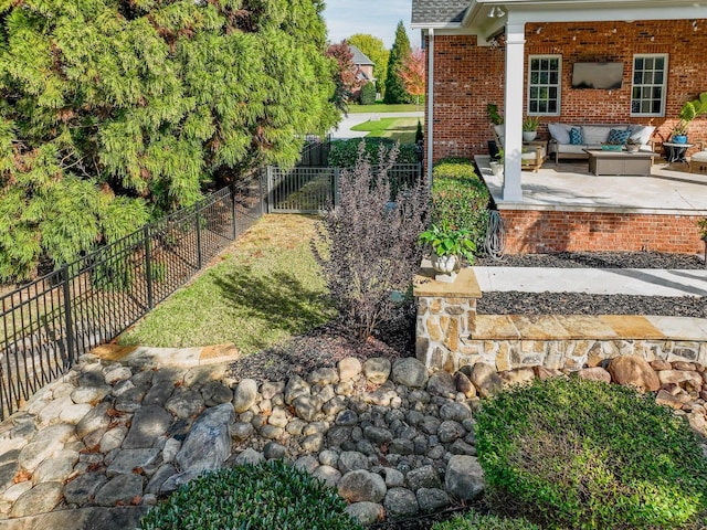 view of yard with a patio area and an outdoor hangout area