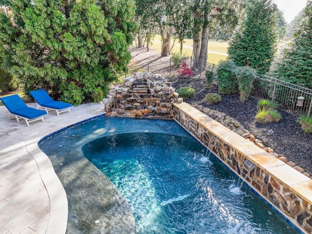 view of pool featuring pool water feature