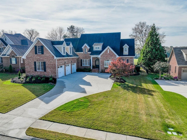 cape cod home with a garage and a front lawn