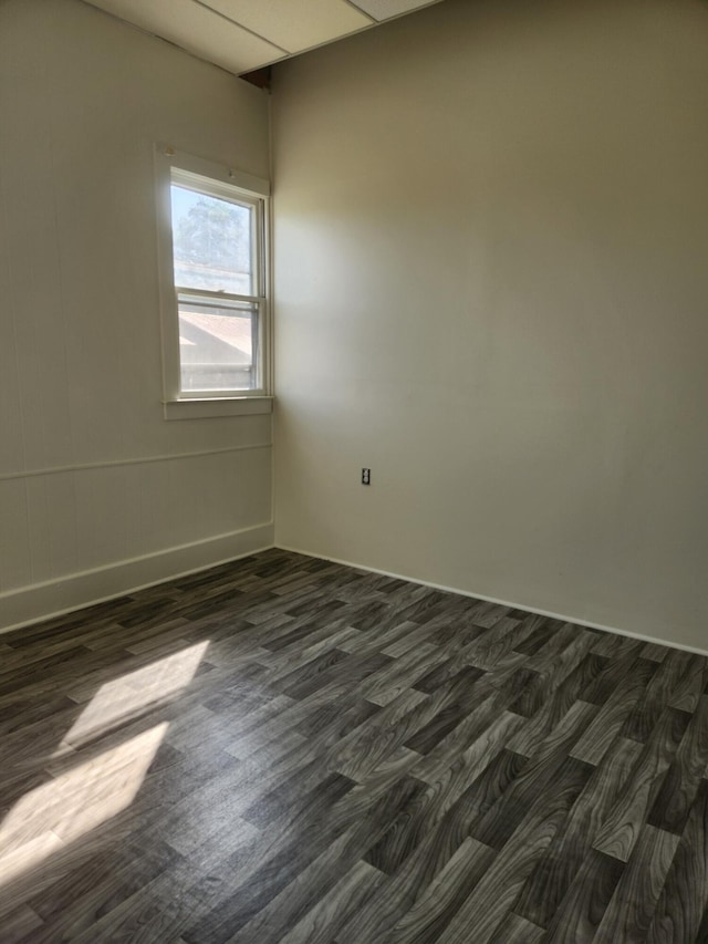 empty room featuring dark hardwood / wood-style floors