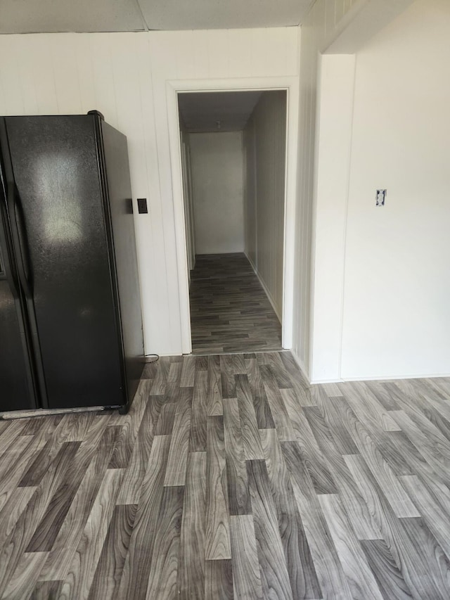 corridor featuring dark wood-type flooring