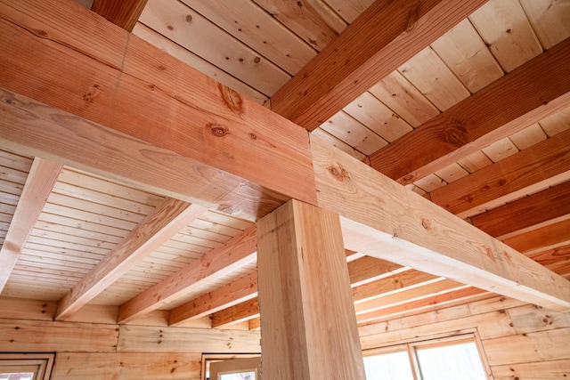 details with beam ceiling and wooden walls