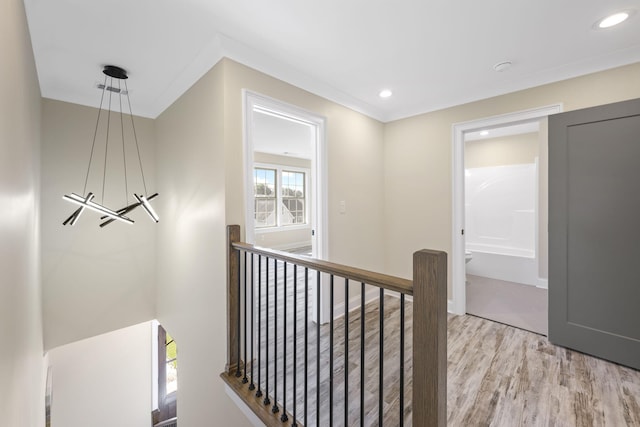 corridor with light hardwood / wood-style flooring