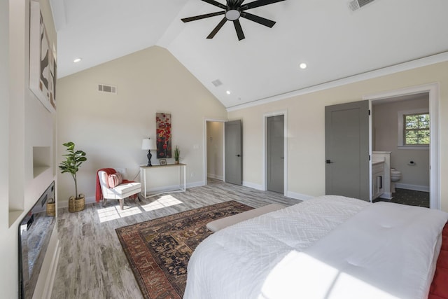 bedroom with ensuite bathroom, ornamental molding, ceiling fan, high vaulted ceiling, and light hardwood / wood-style flooring