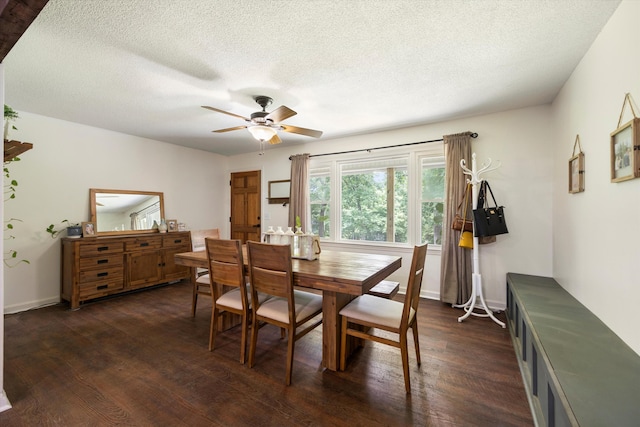 dining area featuring a textured ceiling, dark hardwood / wood-style flooring, and ceiling fan