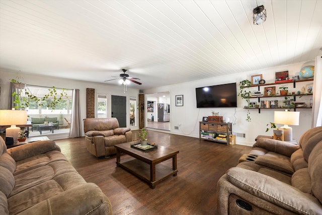 living room with ceiling fan, dark hardwood / wood-style flooring, and wood ceiling