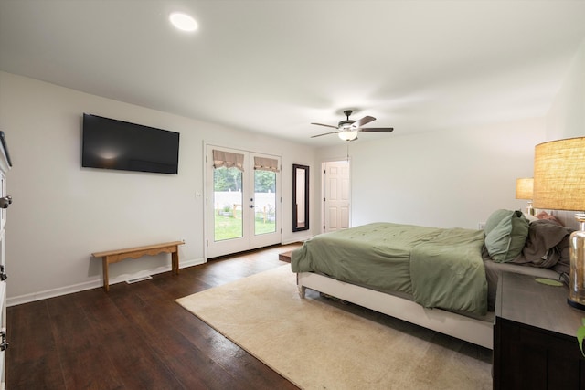 bedroom with ceiling fan, dark hardwood / wood-style floors, access to outside, and french doors