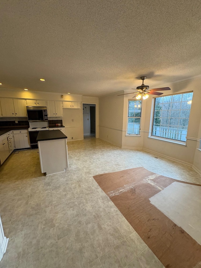 living room featuring ceiling fan