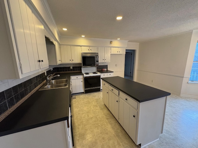 kitchen with white cabinetry, sink, white electric range oven, backsplash, and a kitchen island