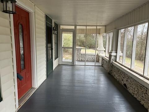 view of unfurnished sunroom