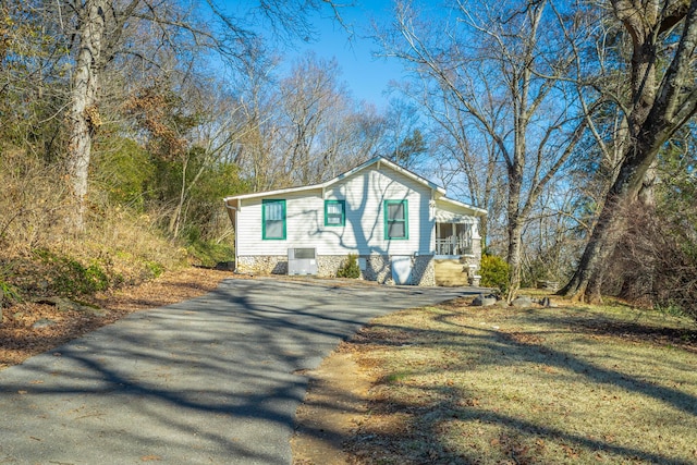 view of front of home with cooling unit