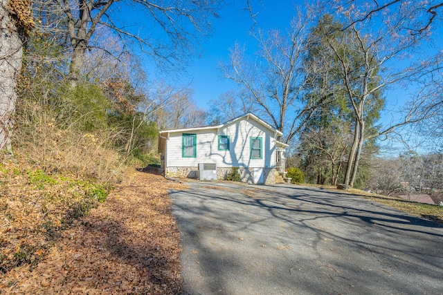 view of front of home featuring central AC unit