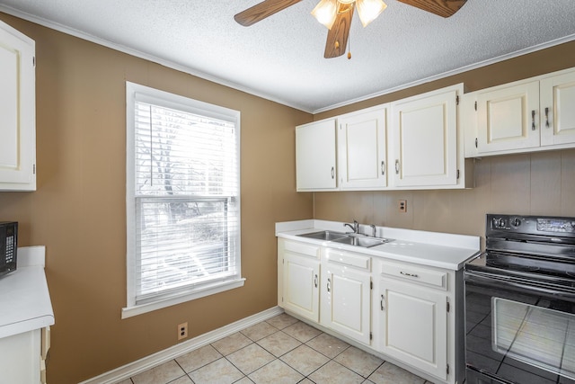 kitchen with sink, white cabinets, light tile patterned floors, and black range with electric cooktop