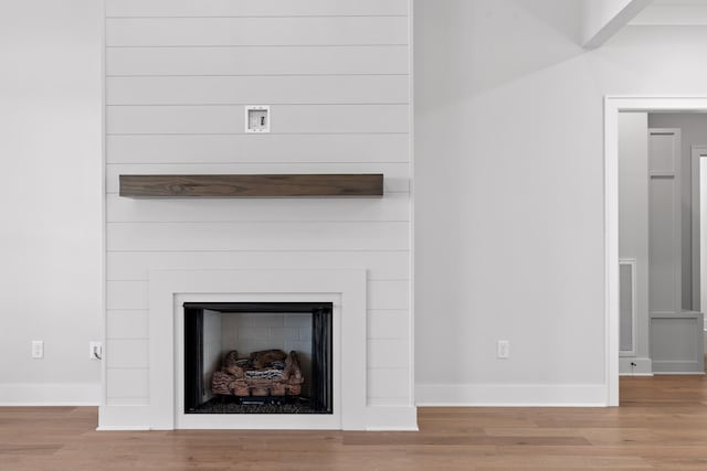 interior details featuring wood-type flooring