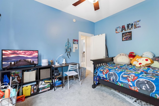 bedroom with ceiling fan and light colored carpet