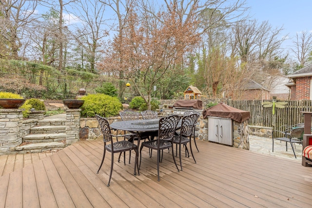 deck with exterior kitchen