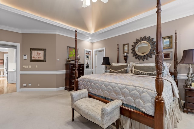 bedroom featuring ceiling fan, light colored carpet, and ornamental molding