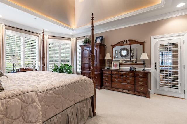 carpeted bedroom with crown molding, access to outside, and a tray ceiling