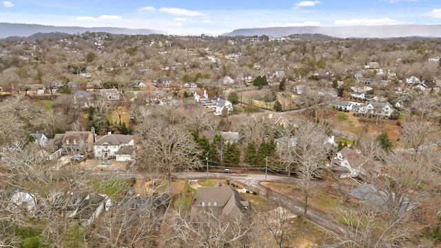 birds eye view of property featuring a mountain view