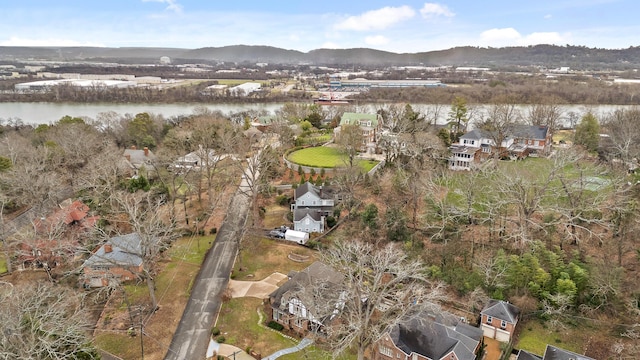 birds eye view of property featuring a water and mountain view