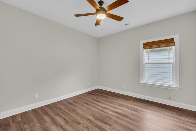 unfurnished room featuring wood-type flooring and ceiling fan