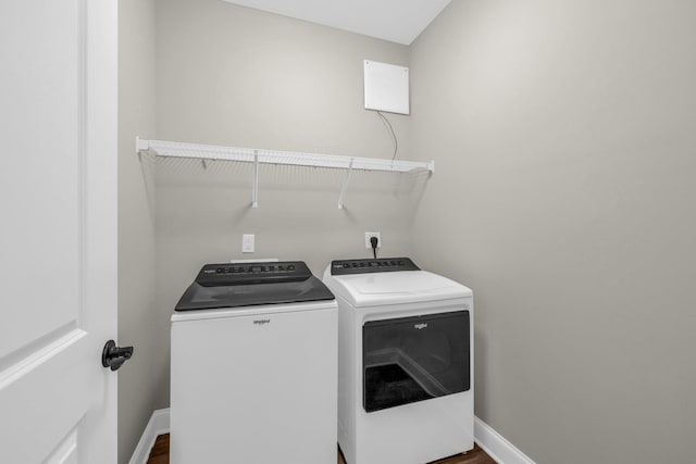 washroom with washing machine and dryer