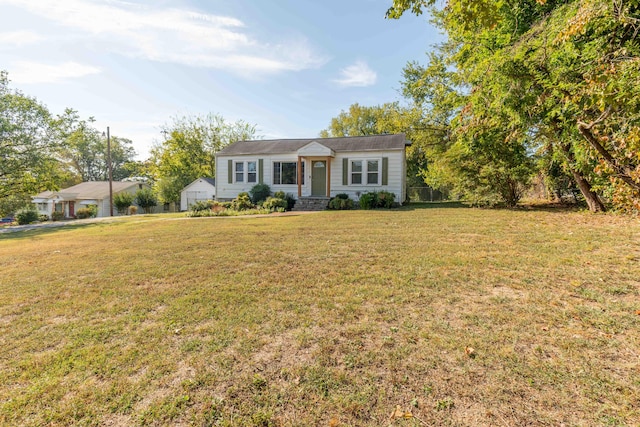 ranch-style home with a front lawn